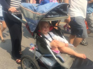 Marched in the parade (read ran) for the first few blocks, then dove into the stroller.