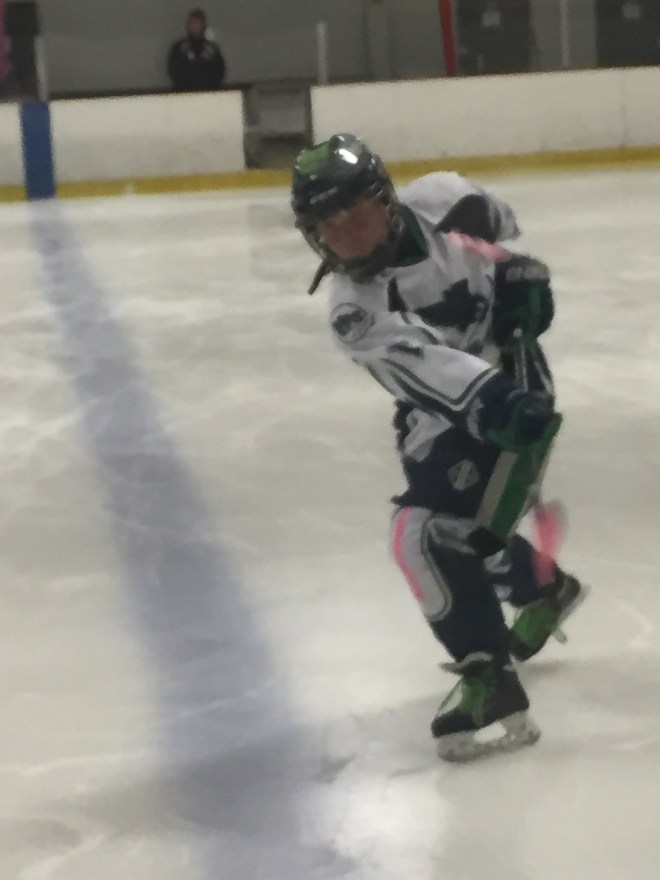 Ashleigh playing for the Kensington Valley Raven's.